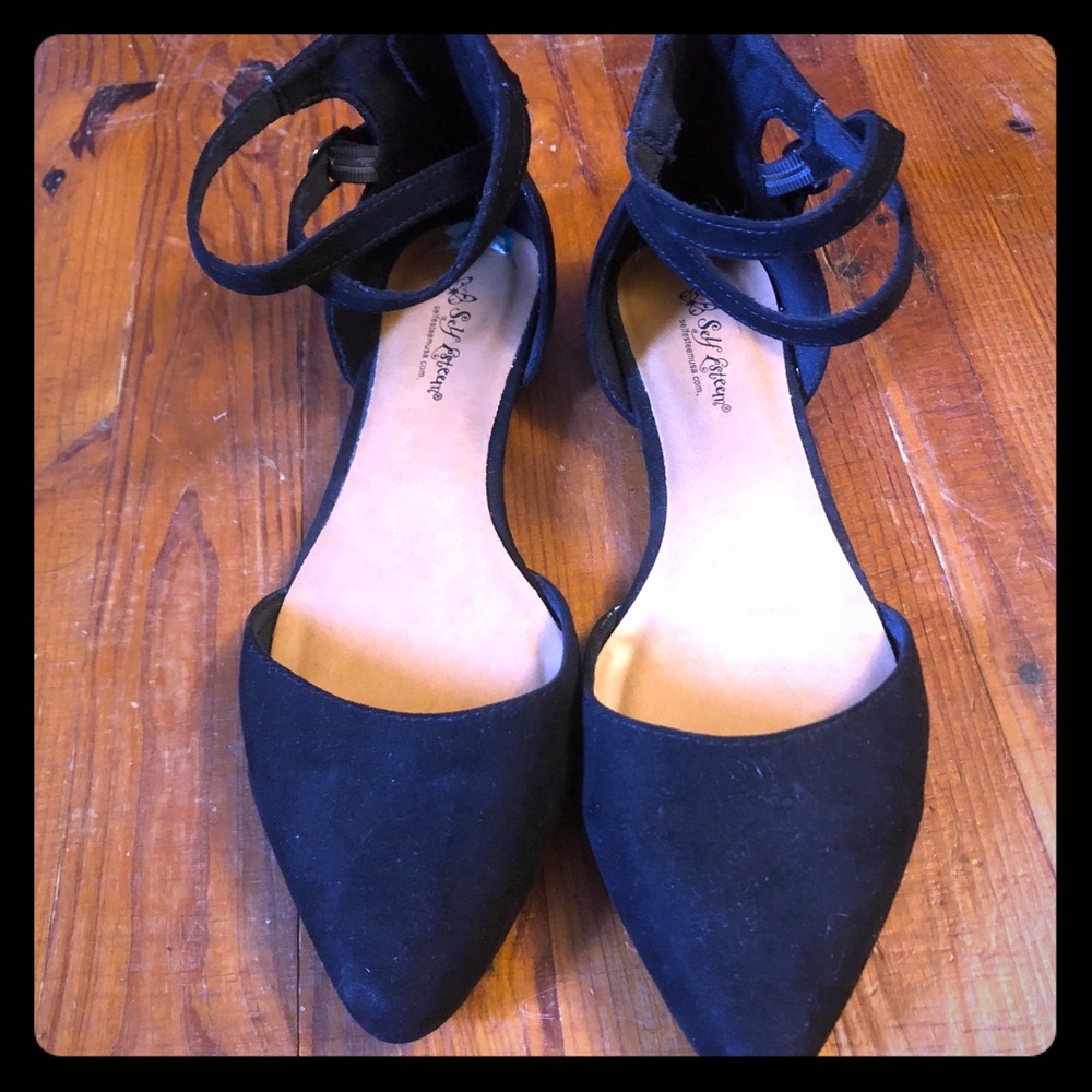 Strapped Black Flats.